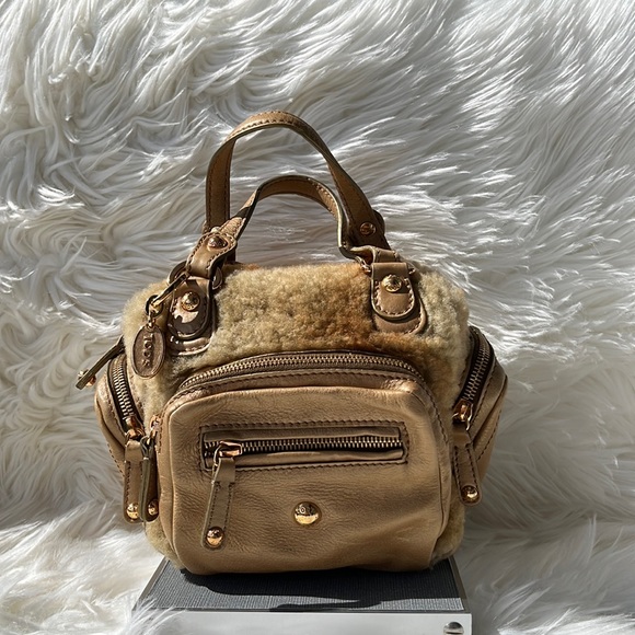 Authentic Tod’s Gold Shearing/Leather Mini Handbag